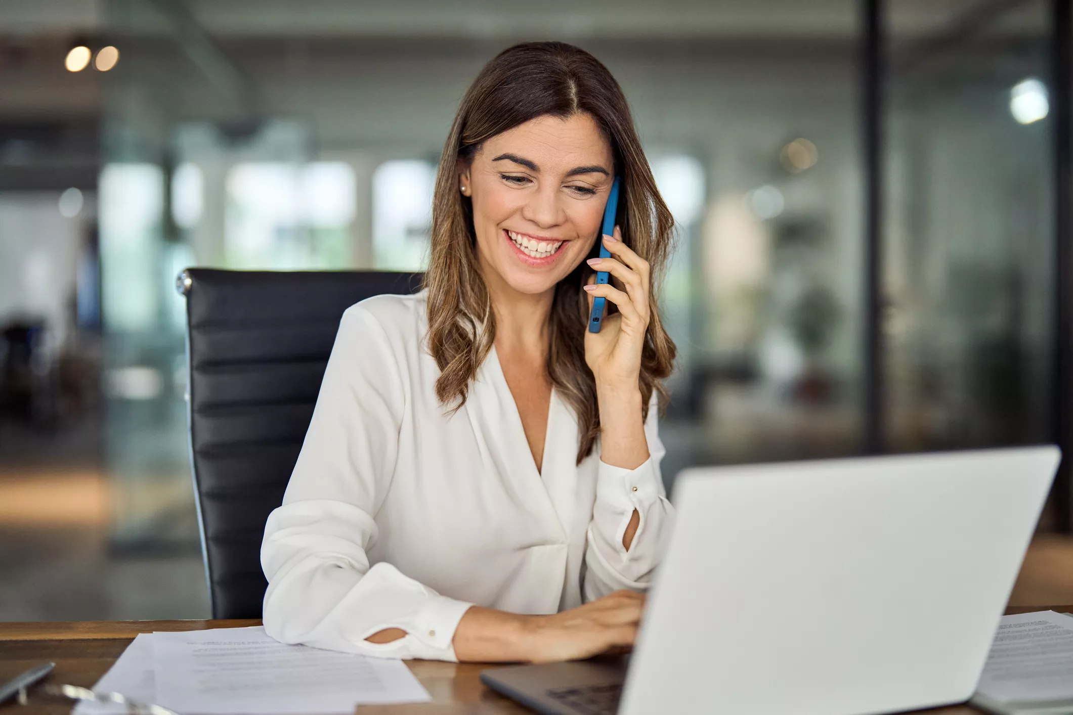 18062026_business-woman-on-phone.jpg